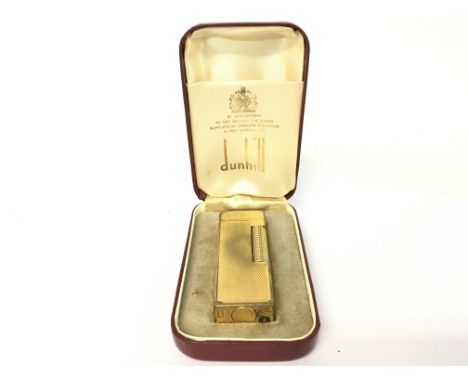 A Dunhill lighter in a fitted box
