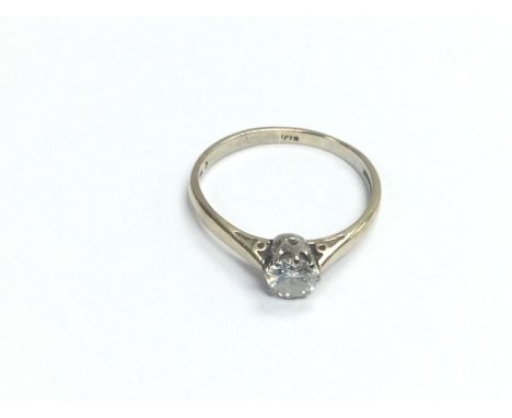 An 18ct gold solitaire diamond ring, approx 2.8g and approx size R. Shipping category A.