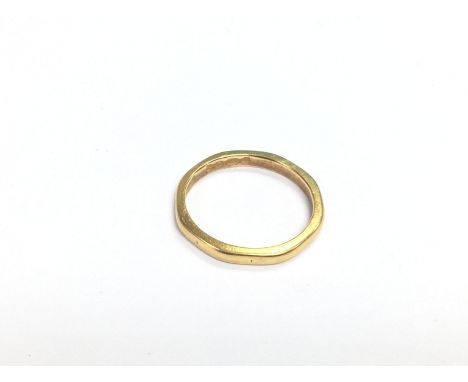 A 22ct gold wedding band, approx 2.8g and approx size J-K. (U13). Shipping category A.