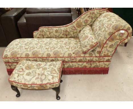 A Victorian style chaise longue and stool in tapestry upholstery
