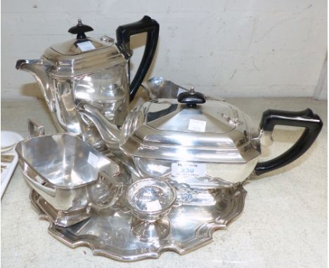 A 4 piece EPNS tea service; a tray and a tea strainer