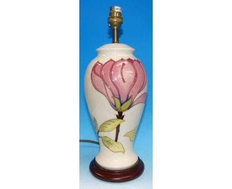 A Moorcroft Magnolia pattern white ground inverted baluster lamp with shade, impressed, height 12"
