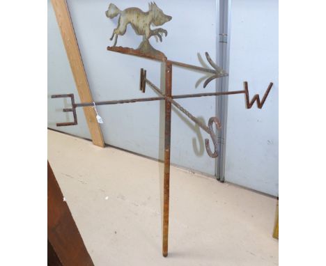 A mid-20th century wrought iron weather vane with fox