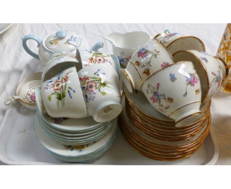 A Shelley "Wild Roses" part tea set, 24 pieces approx; a Royal Staffordshire "Violet Pompadour" part tea service, 24 pieces a