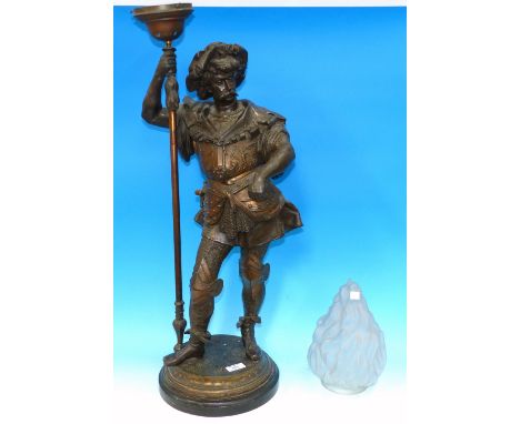 A large floor standing bronzed lamp in the form of a medieval soldier, with flame glass shade, height 41"