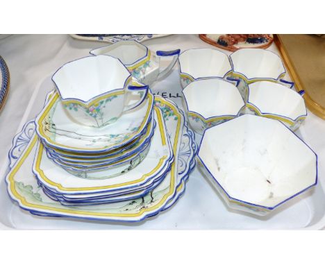 A Shelley Art Deco part tea service decorated with stylized trees, comprising 5 cups, 6 saucers, 6 plates, milk, sugar (a.f.)