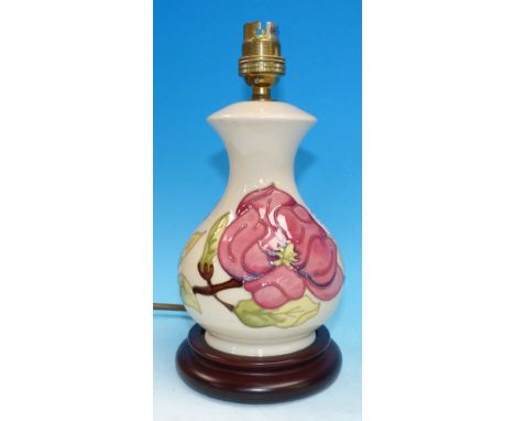 A Moorcroft Magnolia pattern white ground table lamp with silk shade, impressed, height of lamp 7½"