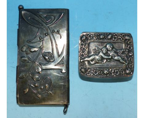 An continental Art Nouveau note pad with embossed decoration, stamped '800'; a continental rectangular patch box with cherubs