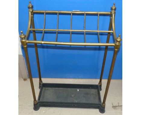 An Edwardian brass 8-division stick stand