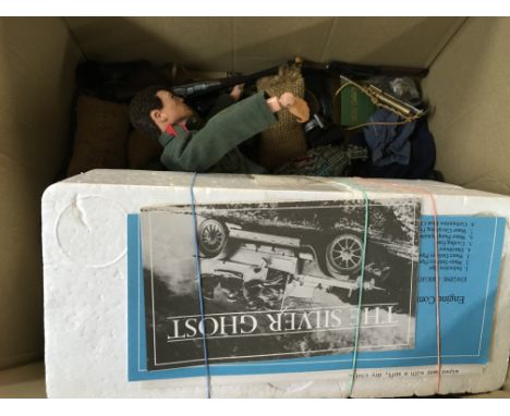 Action man figure with accessories and a boxed silver ghost model car , some damage