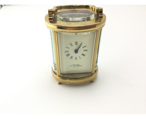 J W Benson oval carriage clock.