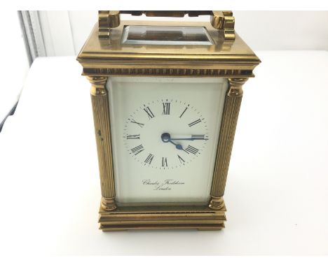 A Charles Frodsham carriage clock. Not seen running.