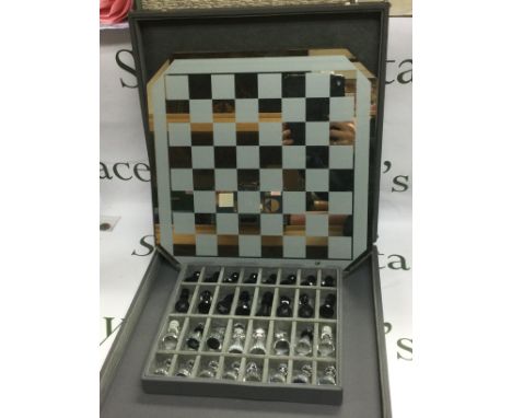 A Swarovski chess set, one piece a/f. Shipping category D.