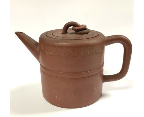An early Yi-Xing terracotta pottery teapot with internal filter, sgraffito decoration to body and 4 character impressed mark 