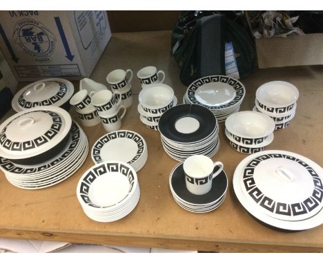 A Susie Cooper designed Wedgwood tea and dinner service in Black Keystone pattern. Some damages. Shipping category D.