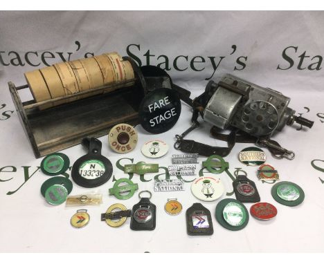 A bus conductor's ticket machine, enamel badges,  rolls of vintage tickets etc. Shipping category C.