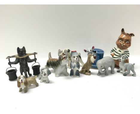 A collection of porcelain Wade whimsies figures and other. This lot cannot be posted