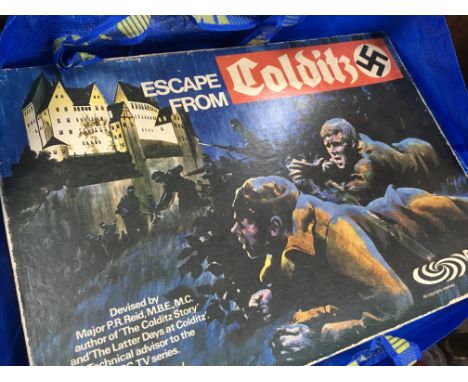 A collection of vintage boxed board games including Dungeons and Dragons fantasy adventure board game, Escape from Colditz, M