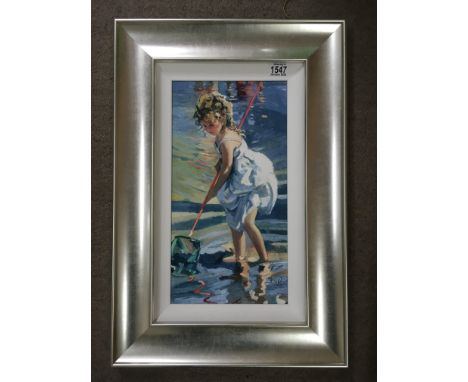 A silver framed limited edition 97/195 print depicting girl paddling with net, by Sheree Valentine Daines