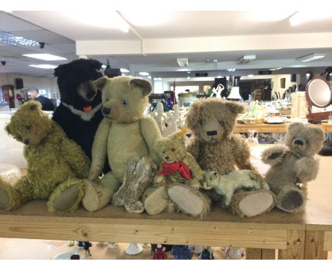 A collection of vintage bears including a Steiff black bear. postage category C