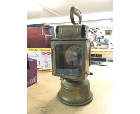 An Unsual all brass carrying lamp with handle by dehail and greener plm French , this lot cannot be posted