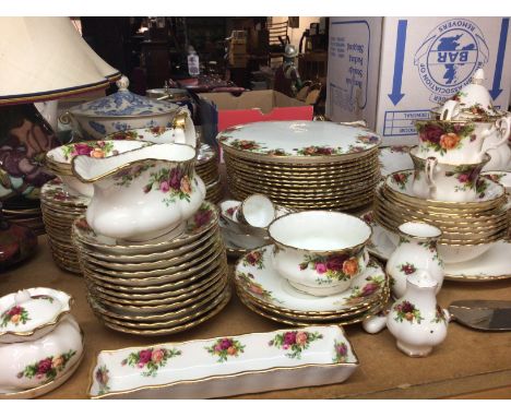 An Extensive Royal Albert Old English country rose dinner and tea set with tureens cups saucers graduating sizes of plates sa