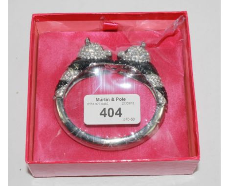 A Butler and Wilson bangle in the form of a panda