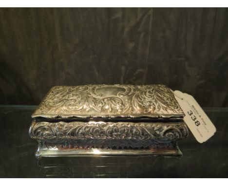 A silver rectangular trinket box decorated in relief, Birmingham 1905