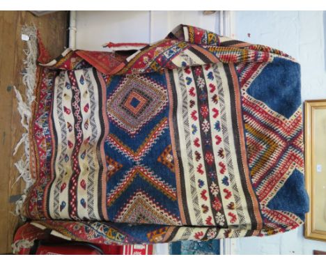 A Kazak carpet, with bands of flatweave and diamond motif pile, 325cm x 202cm