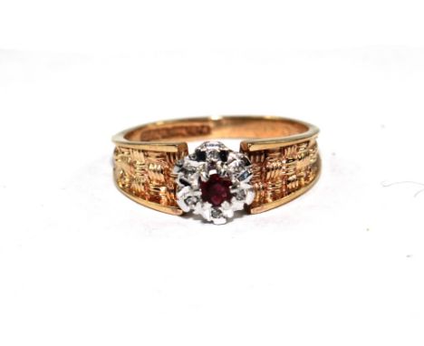 A 9 carat diamond and ruby cluster ring