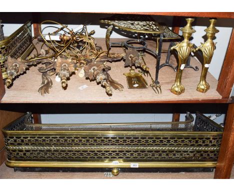 Two Victorian pierced glass fire fenders, two pierced glass trivets, a pair of andirons fire tools and a quantity of gilt met