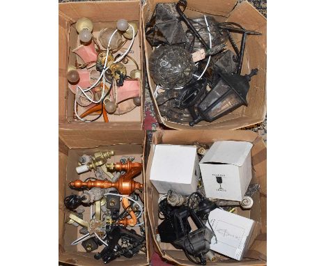 A large quantity of assorted lighting including chandeliers, lanterns, and wall brackets, some boxed and unused (four boxes)