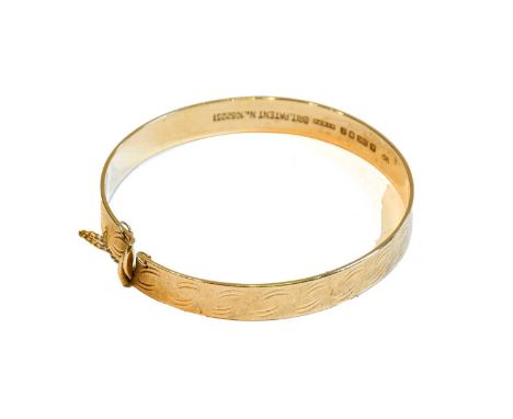 A 9 carat gold bangle, inner measurements 5.7cm by 5.5cmCondition report: Gross weight 15.6 grams.