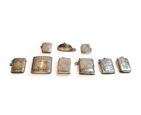 Nine Various silver vesta-cases, variously engraved with foliage or engine-turned, including one modelled as a jockey's cap, 