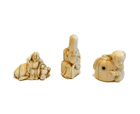 A Japanese ivory netsuke, Edo as Fukurokuju, a netsuke as a boy on an Ox, and another Meiji as a boy with a bag