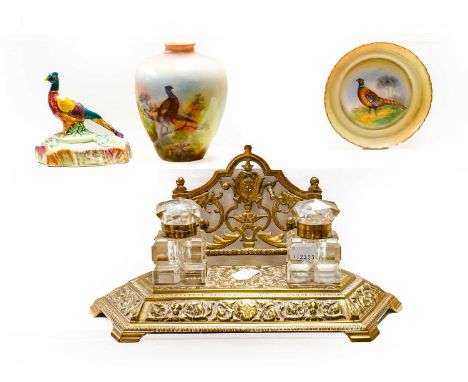 A Locke &amp; Co. Worcester dish painted with a pheasant and signed E. Blake, a Beswick pheasant modelled pin dish, a pheasan