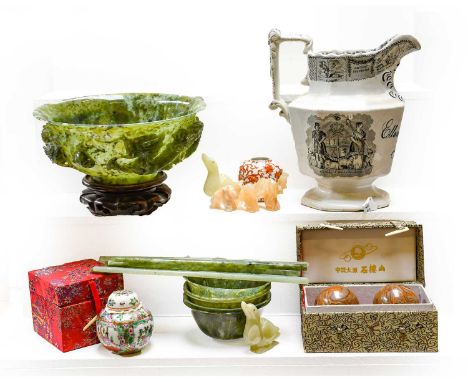 A modern Chinese jade bowl on wooden stand, together with five other bowls, five pairs of chop sticks, carved stone animals, 