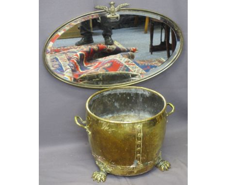 GEORGIAN STYLE BRASS LOG BIN and a vintage oval metal framed mirror, the log bin with twin handles and copper riveted on paw 