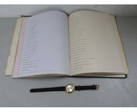 Mixed Lot: A vintage confessional album together with a ladies wristwatch