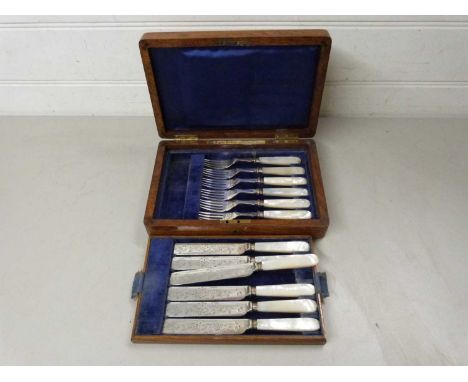 Case of mother of pearl handled dessert cutlery, the case with retailers mark for Mappin Bros London Bridge and Regent Street