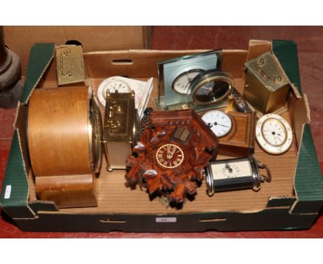 A box of clocks to include mantle clocks, wall mounted cuckoo clock etc.