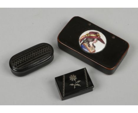 Three 19th century lacquered snuff boxes one set with a porcelain portrait miniature.