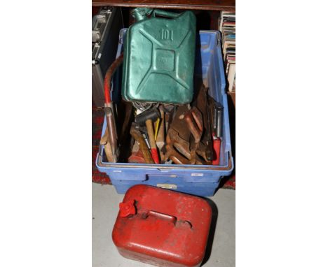 A box of hand tools to include saws, mallets, oil cans etc.