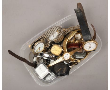 A box of quartz wristwatches by Limit, Casio, Larus and various watch heads.