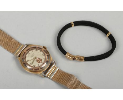 A vintage Clamour gents manual gold plated dress watch with exposed Swiss movement, along with a ladies Rolex cocktail watch 