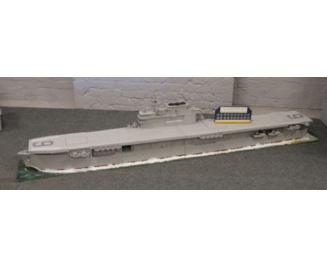 An 8 foot long three section approximately 1/100 scale demonstration model of USS enterprise CV-6 aircraft carrier, along wit