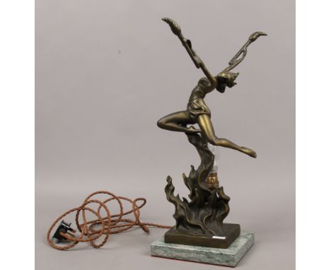 A bronzed Art Deco figural table lamp dancing girl raised on a marble plinth.