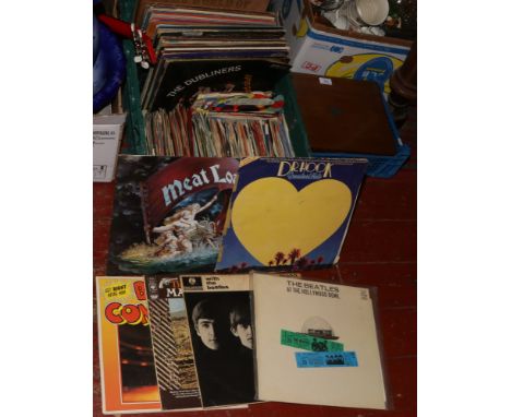 A box of L.P and single records to include The Beatles, The Rolling Stones, T. Rex, The Who etc.