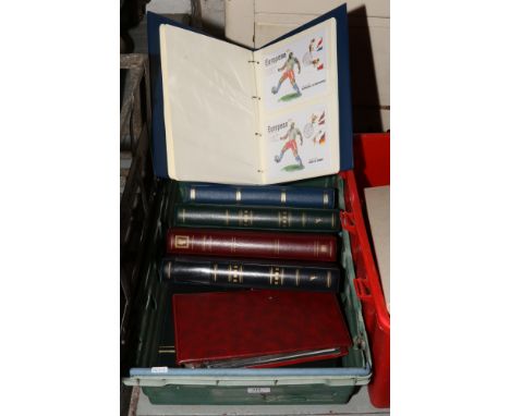 A collection of eight albums containing world stamps, Post Office first day covers, PHQ cards etc.