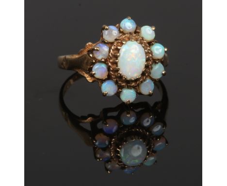 A vintage 9ct gold and opal cluster ring, size P.